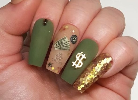 nail design featuring metal 3d nail charms